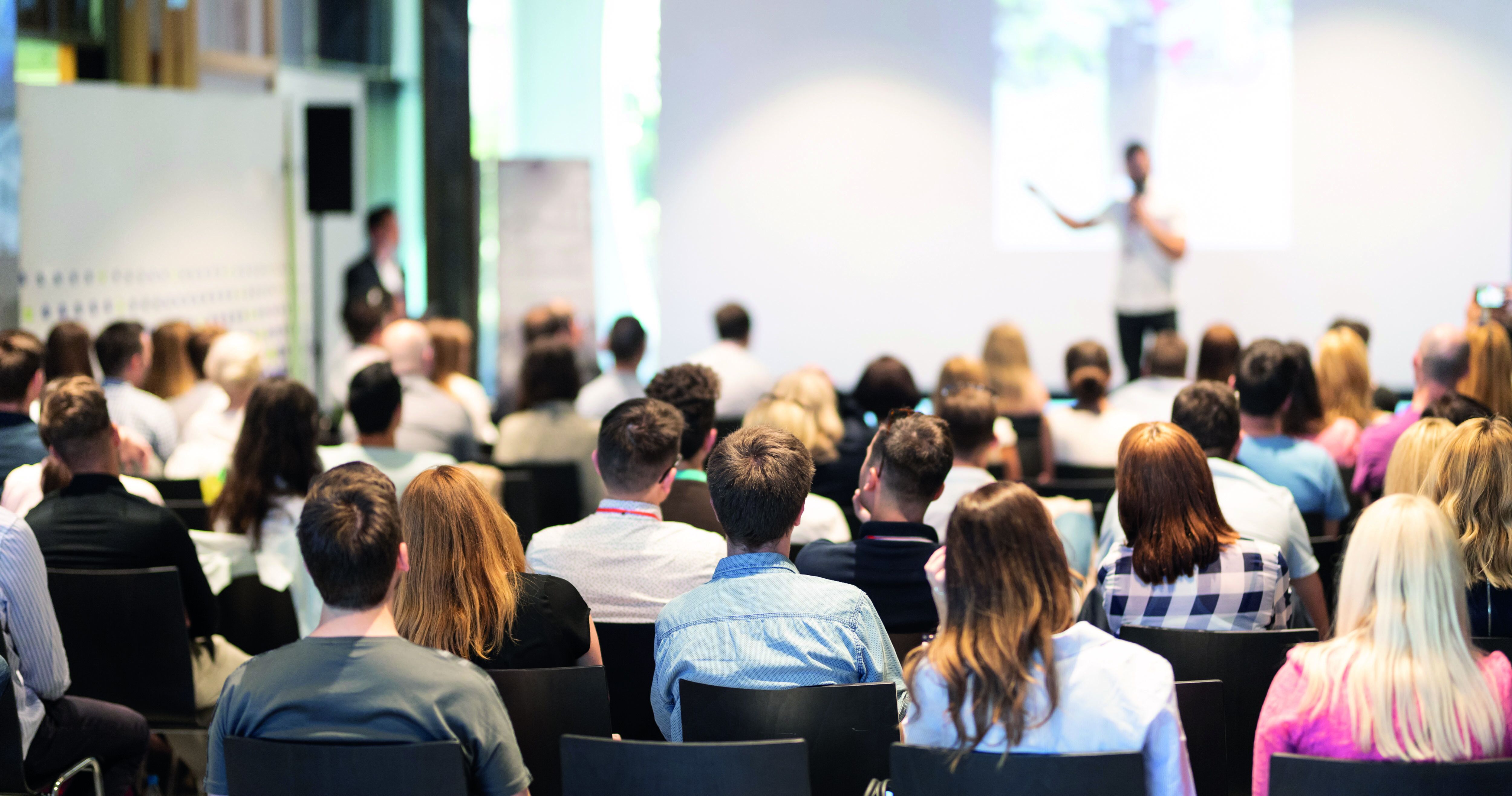 A captivated audience listening intently to a presentation by Palas, absorbing valuable insights and knowledge about the latest advancements in technology.