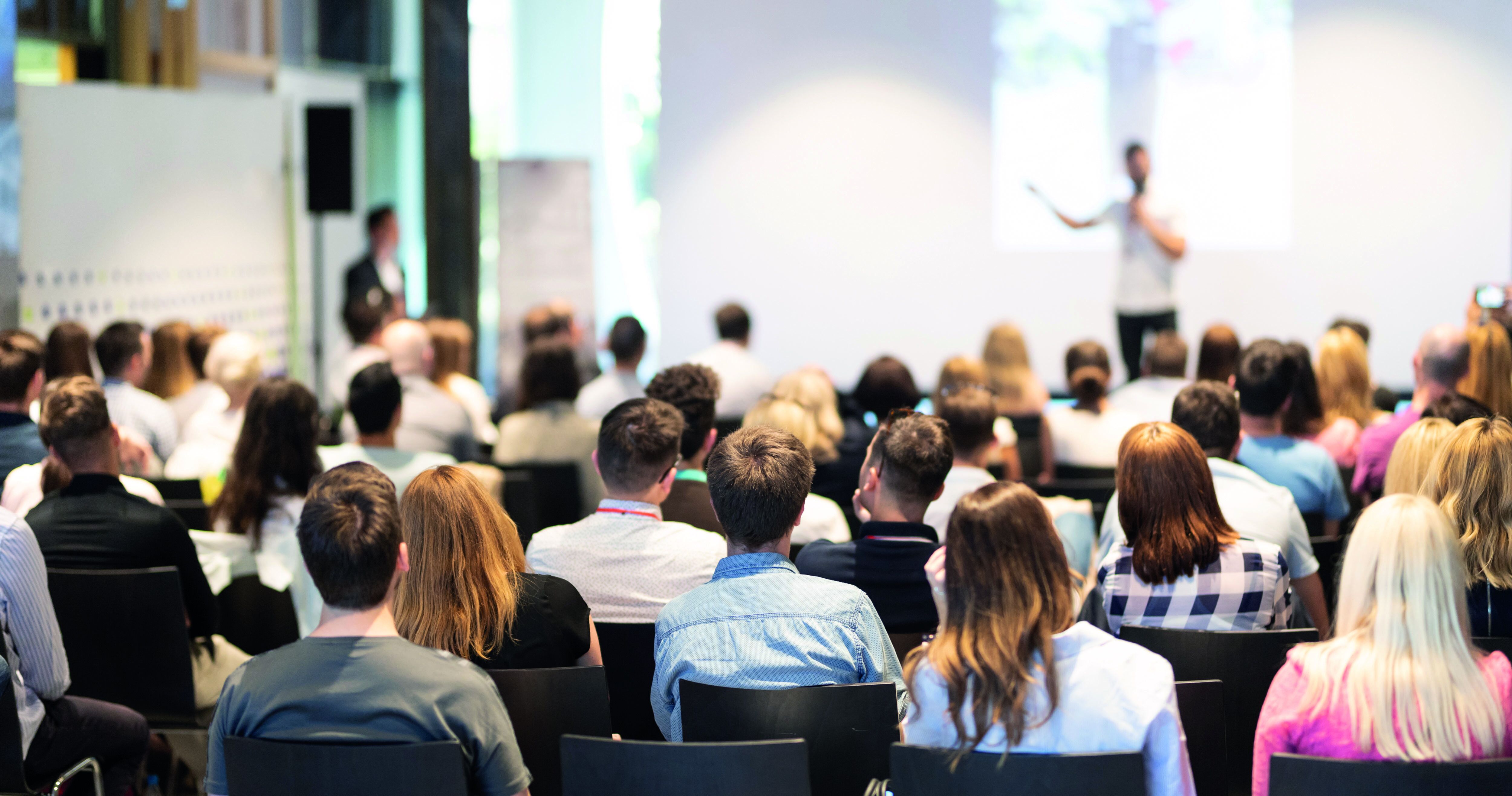 A captivated audience listening intently to a presentation by Palas, absorbing valuable insights and knowledge about the latest advancements in technology.