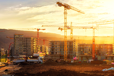 Dynamic view of a construction site in Germany, showcasing the ongoing process of building houses