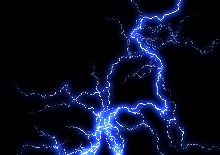 Striking visual of blue glowing lightning on a black background. Palas offers a variety of dischargers designed to neutralize electrical charges on aerosols, particles, and droplets.