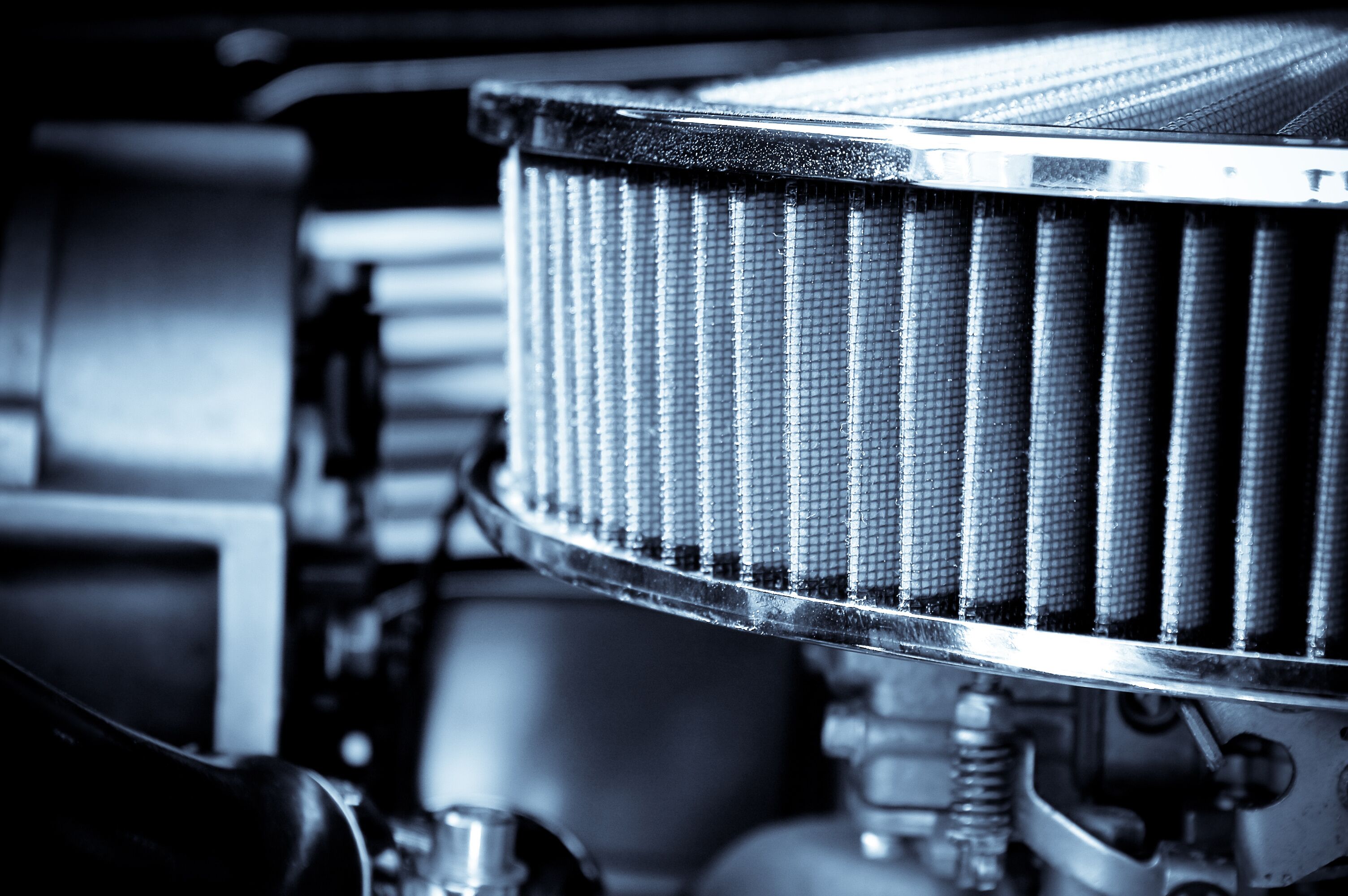 High-detail close-up showcasing an engine filter, a crucial component for maintaining peak performance and efficiency in mechanical systems.