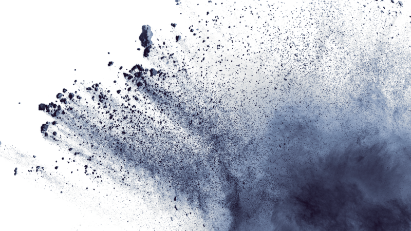 Black particles in air Closup of black particles exploding and spreading in front of a white background. Palas Aerosol Spectrometers measure particle size and particle concentration.